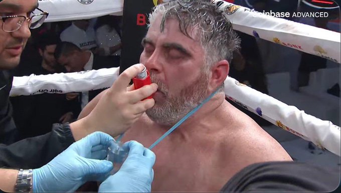 BitBoy receiving attention at ringside during a boxing event